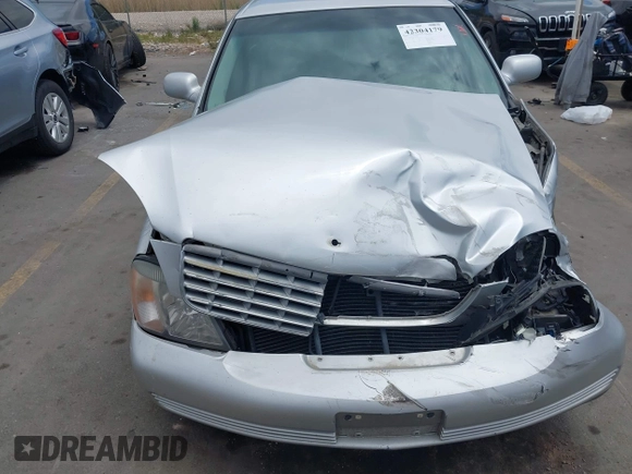 2002 Cadillac DeVille z VIN 1G6KD54Y22U108080, wystawiony jako IAAI lot #42304179 z przebiegiem 278 141 mil mil oraz . Historia ofert i sprzedaży dostępna na DreamBid. Obrazek 12.