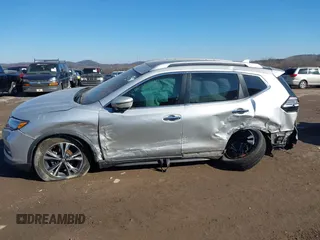 2017 Nissan Rogue SL with VIN JN8AT2MT0HW380062, listed as a IAAI auction lot 41327848 with Not Provided miles and . Bid and sale history available at DreamBid. Image 13.