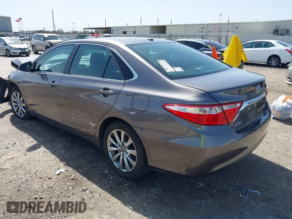 2015 Toyota Camry XLE with VIN 4T1BF1FK0FU952421, listed as a IAAI auction lot 41714622 with 125,553 mi miles and . Bid and sale history available at DreamBid. Image 3.