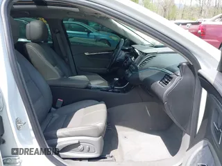 2014 Chevrolet Impala LT with VIN 2G1125S32E9267584, listed as a IAAI auction lot 42079857 with 144,812 mi miles and . Bid and sale history available at DreamBid. Image 5.