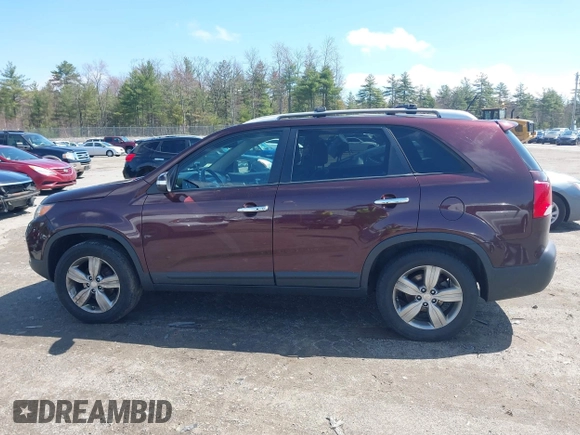 2012 Kia Sorento EX with VIN 5XYKU3A65CG299100, listed as a IAAI auction lot 42098445 with 172,203 mi miles. Bid and sale history available at carsss.com. Image 14.