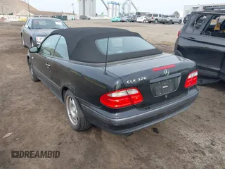 1999 Mercedes-Benz CLK with VIN WDBLK65G1XT013704, listed as a IAAI auction lot 42115880 with 85,741 mi miles. Bid and sale history available at carsss.com. Image 3.