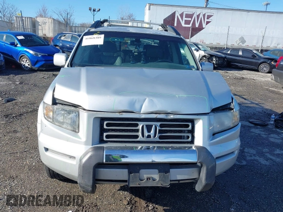 2006 Honda Ridgeline RTL z VIN 2HJYK165X6H570027, wystawiony jako IAAI lot #41868389 z przebiegiem 207 020 mil mil oraz . Historia ofert i sprzedaży dostępna na DreamBid. Obrazek 6.