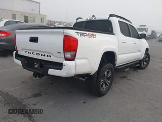 2016 Toyota Tacoma SR with VIN 3TMCZ5AN0GM030469, listed as a IAAI auction lot 41665255 with 178,591 mi miles and . Bid and sale history available at carsss.com. Image 4.