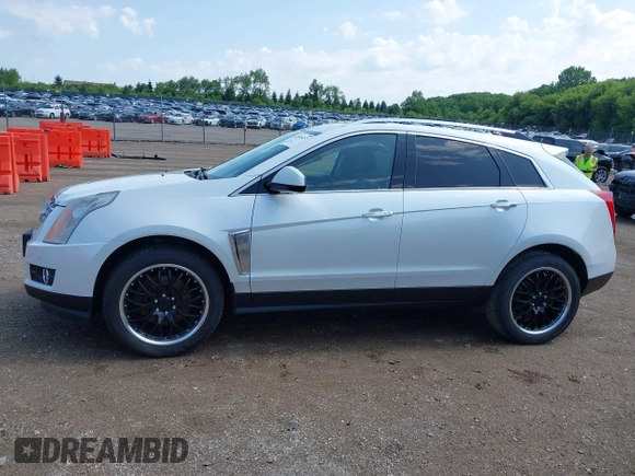 2013 Cadillac SRX Performance Collection with VIN 3GYFNHE3XDS520177, listed as a IAAI auction lot 42536457 with 217,963 mi miles and . Bid and sale history available at DreamBid. Image 14.