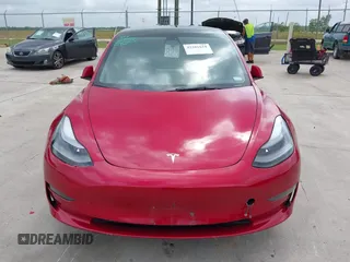2023 Tesla Model 3 with VIN 5YJ3E1EA0PF455058, listed as a IAAI auction lot 42201618 with 31,147 mi miles and . Bid and sale history available at DreamBid. Image 11.
