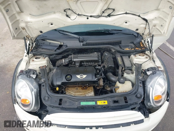 2011 MINI Hardtop z VIN WMWSU3C52BT092653, wystawiony jako IAAI lot #41788535 z przebiegiem 161 510 mil mil oraz . Historia ofert i sprzedaży dostępna na DreamBid. Obrazek 10.