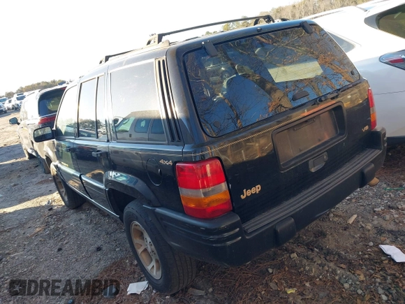 1997 Jeep Grand Cherokee Limited with VIN 1J4GZ78Y7VC688375, listed as a IAAI auction lot 41255946 with 216,544 mi miles. Bid and sale history available at carsss.com. Image 3.