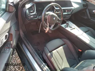 2022 BMW Z4 sDrive30i with VIN WBAHF3C04NWX42062, listed as a Copart auction lot 74989854 with 0 mi miles and Salvage Title. Bid and sale history available at carsss.com. Image 8.