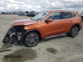 2025 BMW X1 xDrive28i with VIN WBX73EF03S5094250, listed as a Copart auction lot 51174465 with 51 mi miles and Salvage title. Bid and sale history available at DreamBid. Image 1.