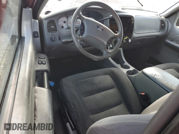 2003 Ford Explorer Sport XLS z VIN 1FMZU70EX3UA38795, wystawiony jako Copart lot #78794334 z przebiegiem 193 925 mil mil oraz Szkody całkowita. Historia ofert i sprzedaży dostępna na DreamBid. Obrazek 8.