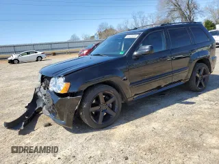 2008 Jeep Grand Cherokee SRT-8 with VIN 1J8HR783X8C157165, listed as a Copart auction lot 49428335 with 134,507 mi miles and Salvage Title. Bid and sale history available at carsss.com. Image 1.