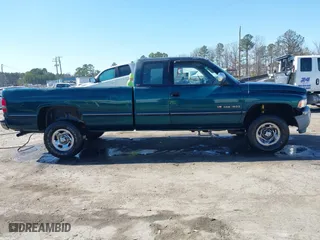 1996 Dodge Ram 1500 with VIN 3B7HF13Z8TG121571, listed as a IAAI auction lot 41759066 with 157,129 mi miles. Bid and sale history available at carsss.com. Image 13.