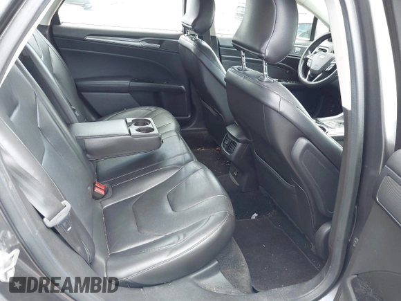 2015 Ford Fusion Titanium with VIN 3FA6P0K96FR283763, listed as a IAAI auction lot 42046868 with 104,542 mi miles. Bid and sale history available at carsss.com. Image 8.