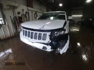 2014 Jeep Grand Cherokee Laredo with VIN 1C4RJFAG2EC132895, listed as a Copart auction lot 49311855 with 147,289 mi miles and Salvage Title. Bid and sale history available at DreamBid. Image 13.