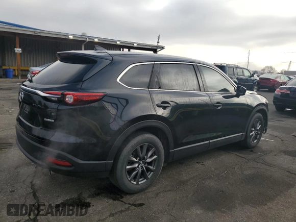 2023 Mazda CX-9 Touring with VIN JM3TCBCY4P0653899, listed as a Copart auction lot 50999985 with 32,896 mi miles and Salvage title. Bid and sale history available at DreamBid. Image 3.