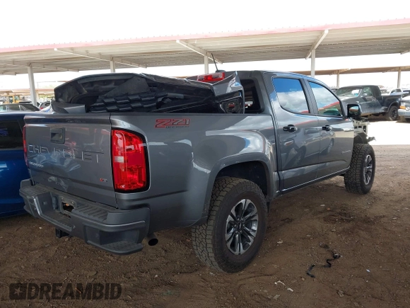 2021 Chevrolet Colorado 4WD Z71 z VIN 1GCGTDEN1M1168618, wystawiony jako IAAI lot #41683565 z przebiegiem 57 697 mil mil oraz . Historia ofert i sprzedaży dostępna na DreamBid. Obrazek 4.