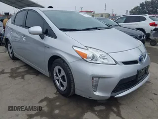 2015 Toyota Prius Four z VIN JTDKN3DUXF1932119, wystawiony jako IAAI lot #42426392 z przebiegiem 84 845 mil mil oraz . Historia ofert i sprzedaży dostępna na DreamBid. Obrazek 1.