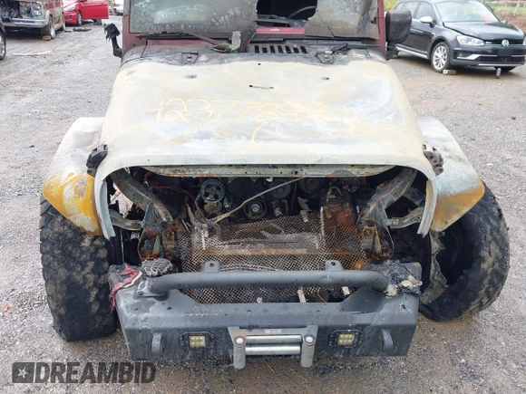 2012 Jeep Wrangler Sport with VIN 1C4AJWAG9CL203018, listed as a IAAI auction lot 42377899 with Not provided miles and . Bid and sale history available at DreamBid. Image 13.