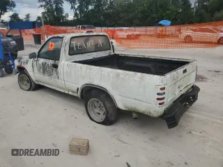 1994 Toyota Pickup with VIN JT4RN81A1R5184105, listed as a Copart auction lot 64042715 with 255,710 mi miles and Clean title. Bid and sale history available at DreamBid. Image 2.