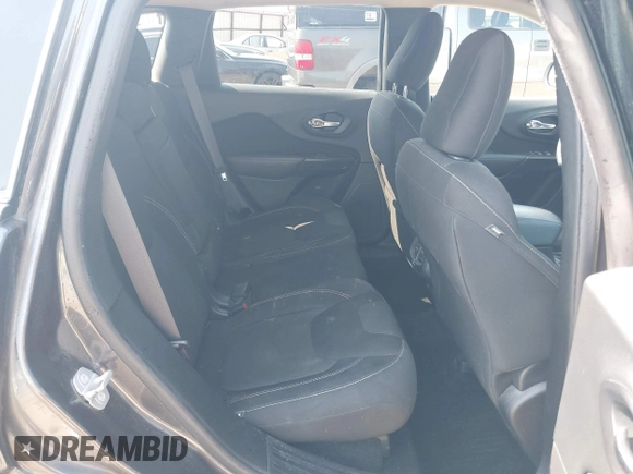 2016 Jeep Cherokee Latitude with VIN 1C4PJLCB1GW113585, listed as a IAAI auction lot 42457964 with 92,736 mi miles and . Bid and sale history available at DreamBid. Image 8.