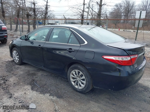 2015 Toyota Camry Hybrid LE with VIN 4T1BD1FK3FU164092, listed as a IAAI auction lot 41886726 with 396,189 mi miles. Bid and sale history available at carsss.com. Image 3.