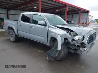 2021 Toyota Tacoma SR z VIN 3TMCZ5AN2MM371724, wystawiony jako IAAI lot #41945786 z przebiegiem 157 761 mil mil oraz . Historia ofert i sprzedaży dostępna na DreamBid. Obrazek 1.