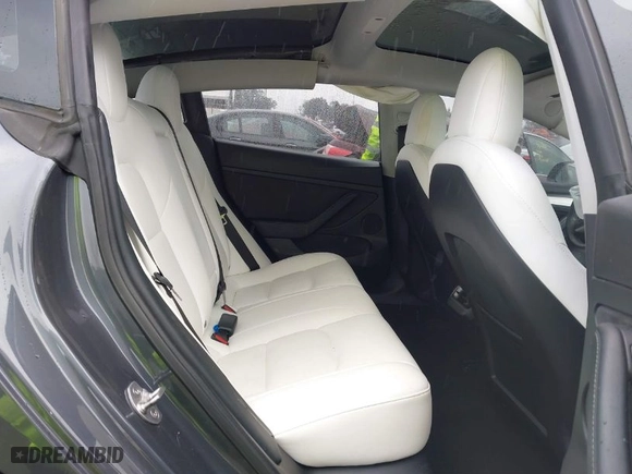 2022 Tesla Model 3 Long Range with VIN 5YJ3E1EBXNF138538, listed as a IAAI auction lot 41771647 with 31,250 mi miles. Bid and sale history available at carsss.com. Image 8.