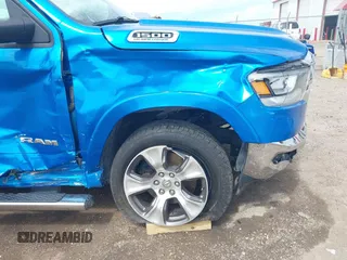 2021 Ram 1500 Laramie with VIN 1C6SRFJT1MN774879, listed as a IAAI auction lot 42242318 with 51,971 mi miles and . Bid and sale history available at DreamBid. Image 6.