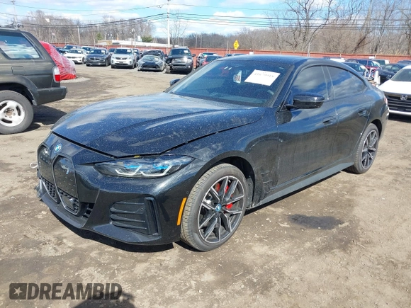 2024 BMW i4 xDrive40 z VIN WBY83FB04RFT19615, wystawiony jako IAAI lot #41679918 z przebiegiem 3 883 mil mil oraz . Historia ofert i sprzedaży dostępna na DreamBid. Obrazek 22.