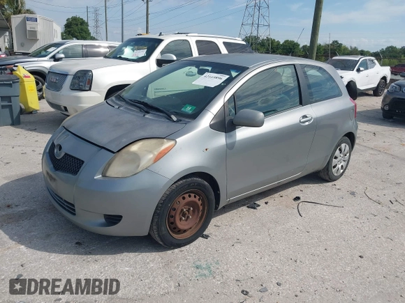 2008 Toyota Yaris with VIN JTDJT923185180160, listed as a IAAI auction lot 42169896 with 340,931 mi miles. Bid and sale history available at carsss.com. Image 2.