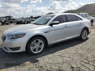 2015 Ford Taurus SEL with VIN 1FAHP2E88FG121647, listed as a Copart auction lot 51660585 with 155,686 mi miles and Clean Title. Bid and sale history available at DreamBid. Image 1.