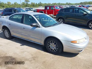 2004 Oldsmobile Alero GL1 z VIN 1G3NL52F54C206964, wystawiony jako IAAI lot #42160307 z przebiegiem 129 808 mil mil oraz . Historia ofert i sprzedaży dostępna na DreamBid. Obrazek 1.