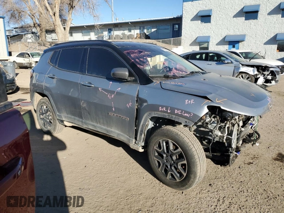2019 Jeep Compass Trailhawk with VIN 3C4NJDDB8KT748104, listed as a Copart auction lot 87059844 with 112,934 mi miles and Salvage Title. Bid and sale history available at carsss.com. Image 4.