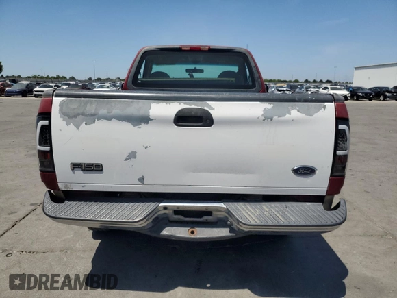 2000 Ford F-150 XL with VIN 2FTZF172XYCA85601, listed as a Copart auction lot 59134645 with Not provided miles and Salvage title. Bid and sale history available at DreamBid. Image 6.
