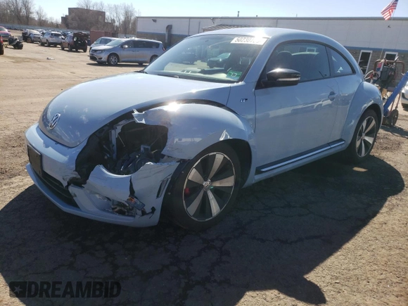 2014 Volkswagen Beetle Turbo R-Line with VIN 3VWVT7AT1EM639374, listed as a Copart auction lot 50230785 with 54,818 mi miles and Salvage Title. Bid and sale history available at DreamBid. Image 1.
