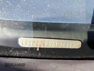1986 Pontiac Fiero z VIN 1G2PG9799GP261135, wystawiony jako Copart lot #77305934 z przebiegiem 53 837 mil mil oraz Szkody całkowita. Historia ofert i sprzedaży dostępna na DreamBid. Obrazek 13.