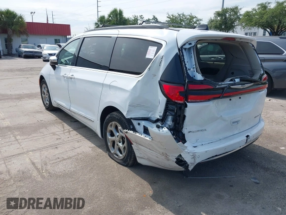 2023 Chrysler Pacifica Limited with VIN 2C4RC1GG7PR566163, listed as a IAAI auction lot 42393988 with 59,354 mi miles and . Bid and sale history available at DreamBid. Image 3.