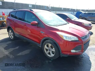 2015 Ford Escape SE with VIN 1FMCU0GX3FUC80207, listed as a IAAI auction lot 41665897 with 153,891 mi miles. Bid and sale history available at carsss.com. Image 1.