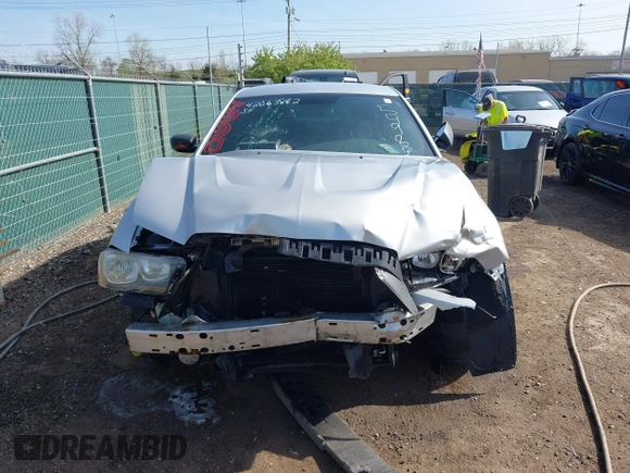 2013 Dodge Charger Police z VIN 2C3CDXAT9DH549866, wystawiony jako IAAI lot #42063862 z przebiegiem 145 191 mil mil oraz . Historia ofert i sprzedaży dostępna na DreamBid. Obrazek 12.