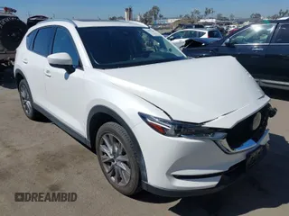 2020 Mazda CX-5 Grand Touring with VIN JM3KFADM0L1838495, listed as a IAAI auction lot 41991566 with 32,021 mi miles. Bid and sale history available at carsss.com. Image 1.
