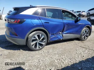 2022 Volkswagen ID.4 Pro S z VIN WVGUNPE29NP071844, wystawiony jako Copart lot #49249195 z przebiegiem 23 970 mil mil oraz Szkoda całkowita • Salvage title. Historia ofert i sprzedaży dostępna na DreamBid. Obrazek 3.