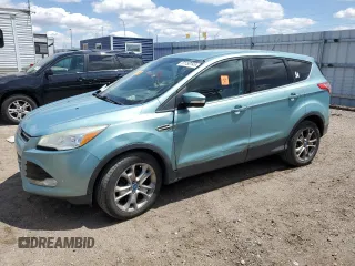 2013 Ford Escape SEL z VIN 1FMCU9H96DUB71063, wystawiony jako Copart lot #57750145 z przebiegiem 167 738 mil mil oraz Szkoda całkowita • Salvage title. Historia ofert i sprzedaży dostępna na DreamBid. Obrazek 1.
