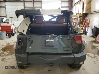 2012 Jeep Wrangler Unlimited Rubicon with VIN 1C4HJWFG4CL119390, listed as a Copart auction lot 60026425 with 305,189 mi miles and Salvage title. Bid and sale history available at DreamBid. Image 6.