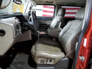 2003 Hummer H2 z VIN 5GRGN23U93H138182, wystawiony jako Copart lot #51842085 z przebiegiem 170 659 mil mil oraz Tytuł czysty. Historia ofert i sprzedaży dostępna na DreamBid. Obrazek 7.