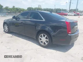 2009 Cadillac CTS RWD z VIN 1G6DF577190151588, wystawiony jako IAAI lot #42307738 z przebiegiem 185 441 mil mil oraz . Historia ofert i sprzedaży dostępna na DreamBid. Obrazek 3.