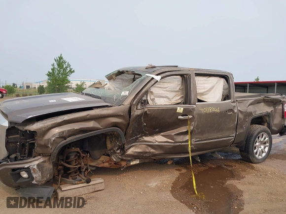 2015 GMC Sierra 1500 Denali z VIN 3GTU2WEJ6FG174160, wystawiony jako IAAI lot #40118246 z przebiegiem Nie podano mil oraz . Historia ofert i sprzedaży dostępna na DreamBid. Obrazek 6.