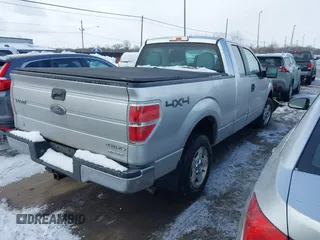 2014 Ford F-150 XL with VIN 1FTEX1EM2EFC66630, listed as a IAAI auction lot 41621780 with 169,624 mi miles and . Bid and sale history available at carsss.com. Image 4.