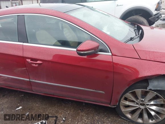 2013 Volkswagen CC VR6 Executive 4Motion with VIN WVWGU7AN9DE561506, listed as a IAAI auction lot 41459074 with 70,128 mi miles. Bid and sale history available at carsss.com. Image 12.