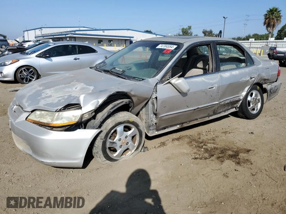 1998 Honda Accord EX z VIN 1HGCG555XWA040830, wystawiony jako Copart lot #74704554 z przebiegiem 253 788 mil mil oraz Szkoda całkowita • Salvage title. Historia ofert i sprzedaży dostępna na DreamBid. Obrazek 1.